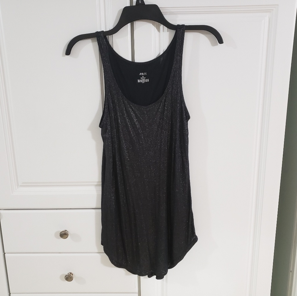 Jennifer Lopez black glitter tank